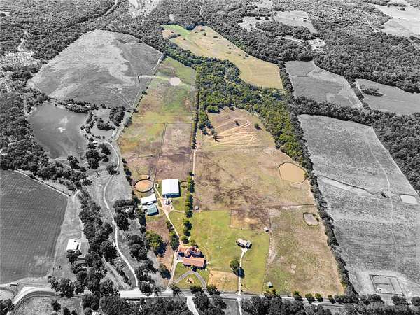 139 Acres of Land with Home for Sale in Aubrey, Texas