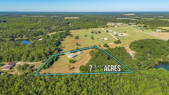 7.71 Acres of Land with Home for Sale in Baker, Florida