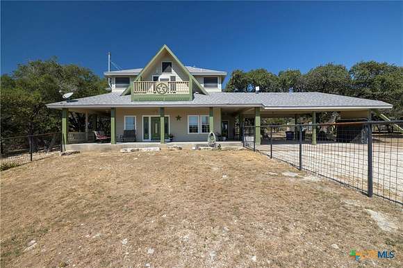 12.55 Acres of Land with Home for Sale in Liberty Hill, Texas