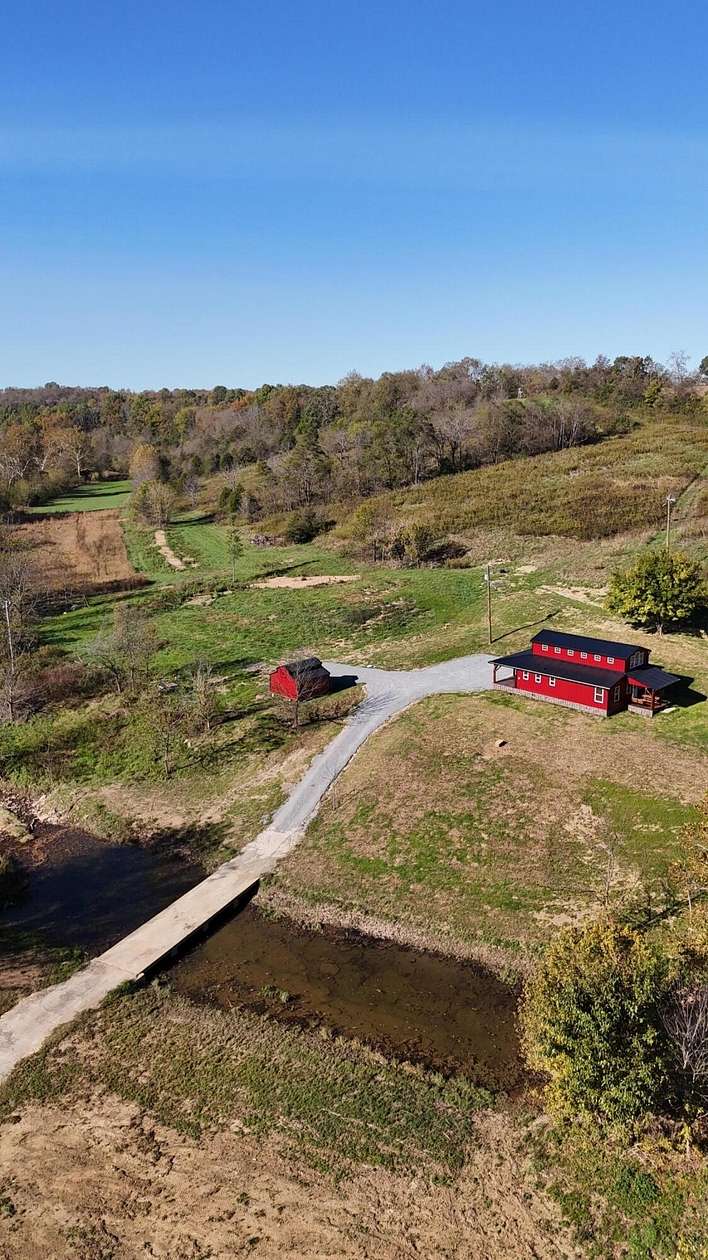 65 Acres of Land with Home for Sale in Ewing, Kentucky