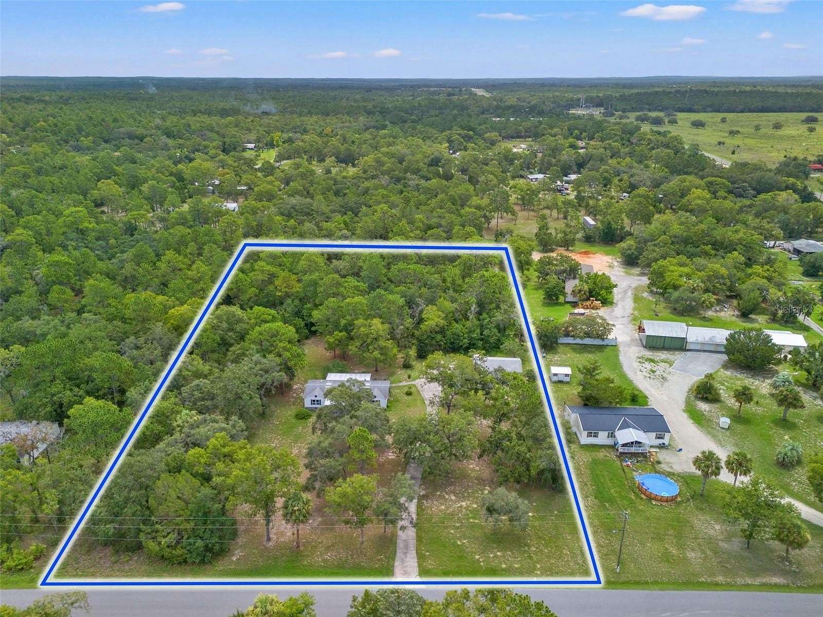 4.73 Acres of Residential Land with Home for Sale in Homosassa, Florida