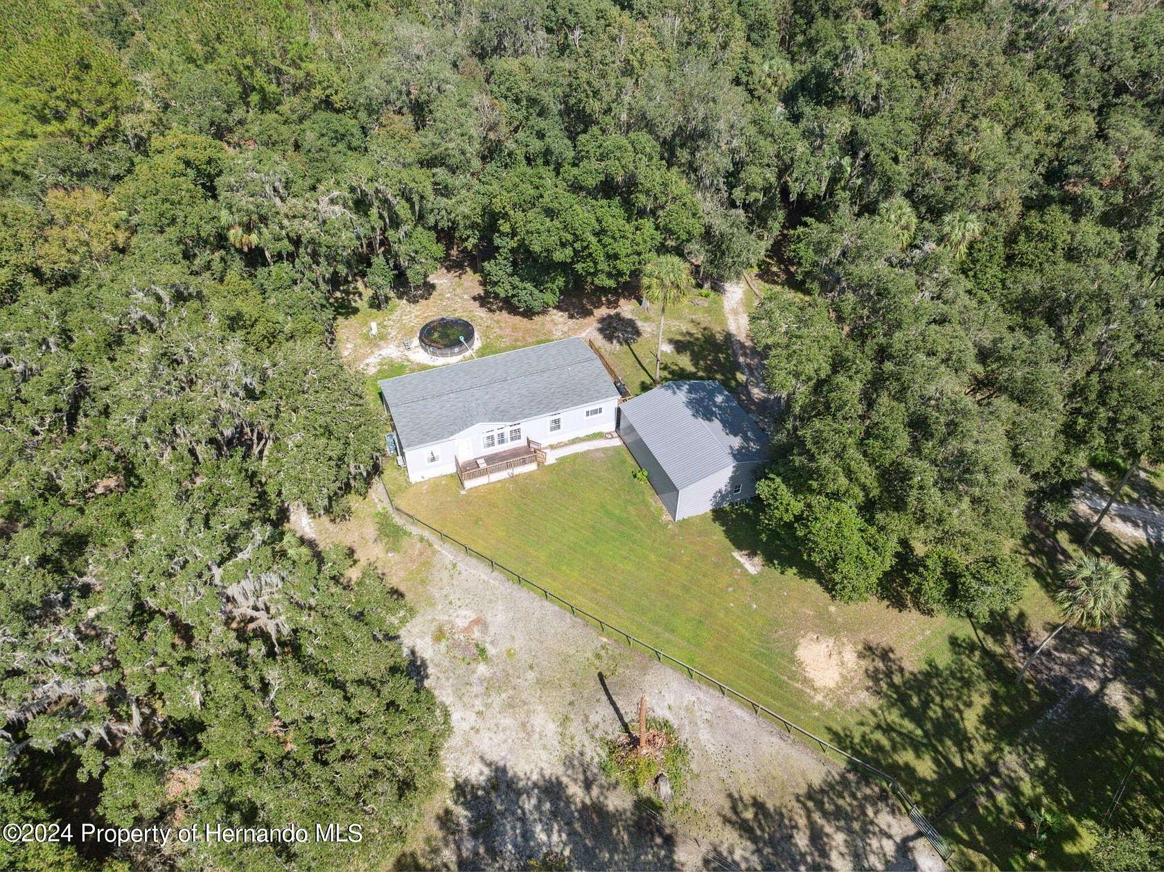 8.7 Acres of Land with Home for Sale in Brooksville, Florida