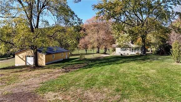 3.5 Acres of Residential Land with Home for Auction in New Philadelphia, Ohio