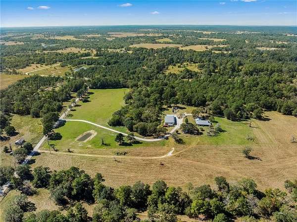 20 Acres of Land with Home for Sale in Bedias, Texas