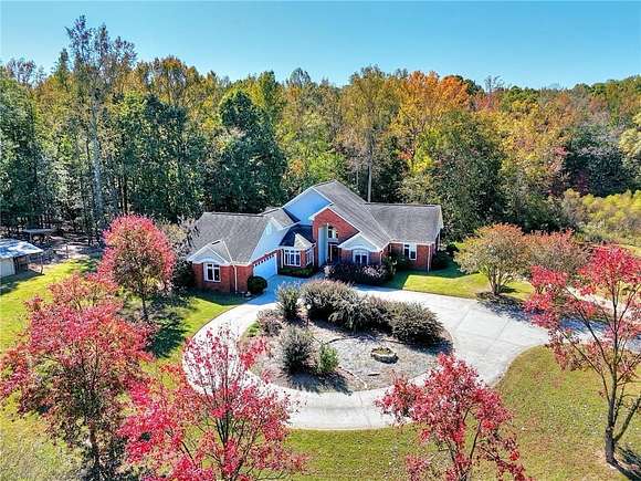 5.61 Acres of Land with Home for Sale in Commerce, Georgia