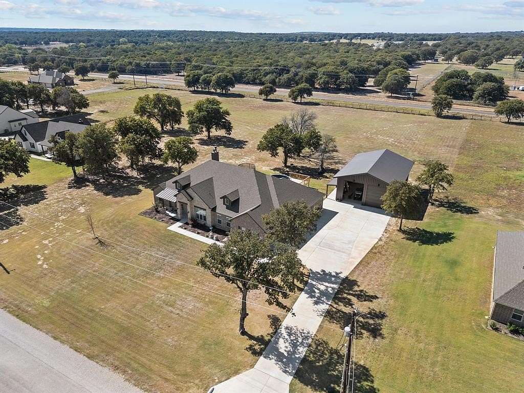 2.005 Acres of Residential Land with Home for Sale in Poolville, Texas