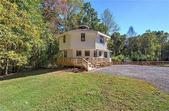 5.12 Acres of Land with Home for Sale in Canton, Georgia