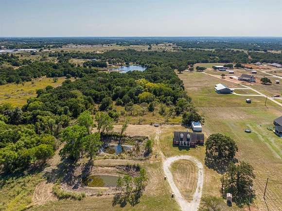 2 Acres of Residential Land with Home for Sale in Decatur, Texas