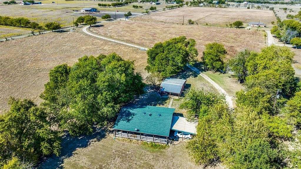 33.3 Acres of Agricultural Land with Home for Sale in Sanger, Texas