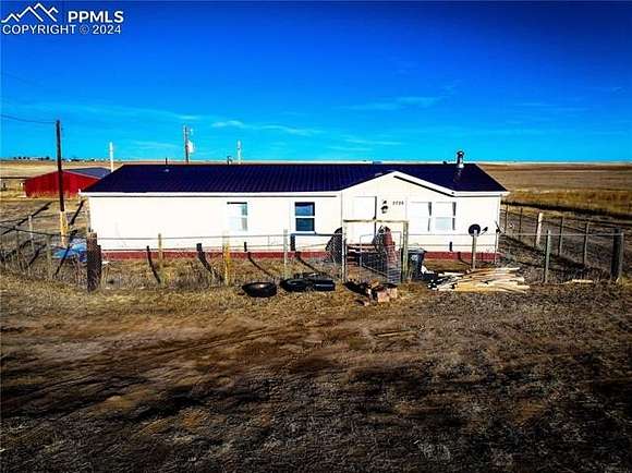 72.07 Acres of Agricultural Land with Home for Sale in Rush, Colorado