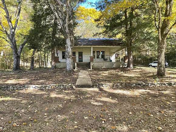 6.85 Acres of Residential Land with Home for Sale in Lutts, Tennessee