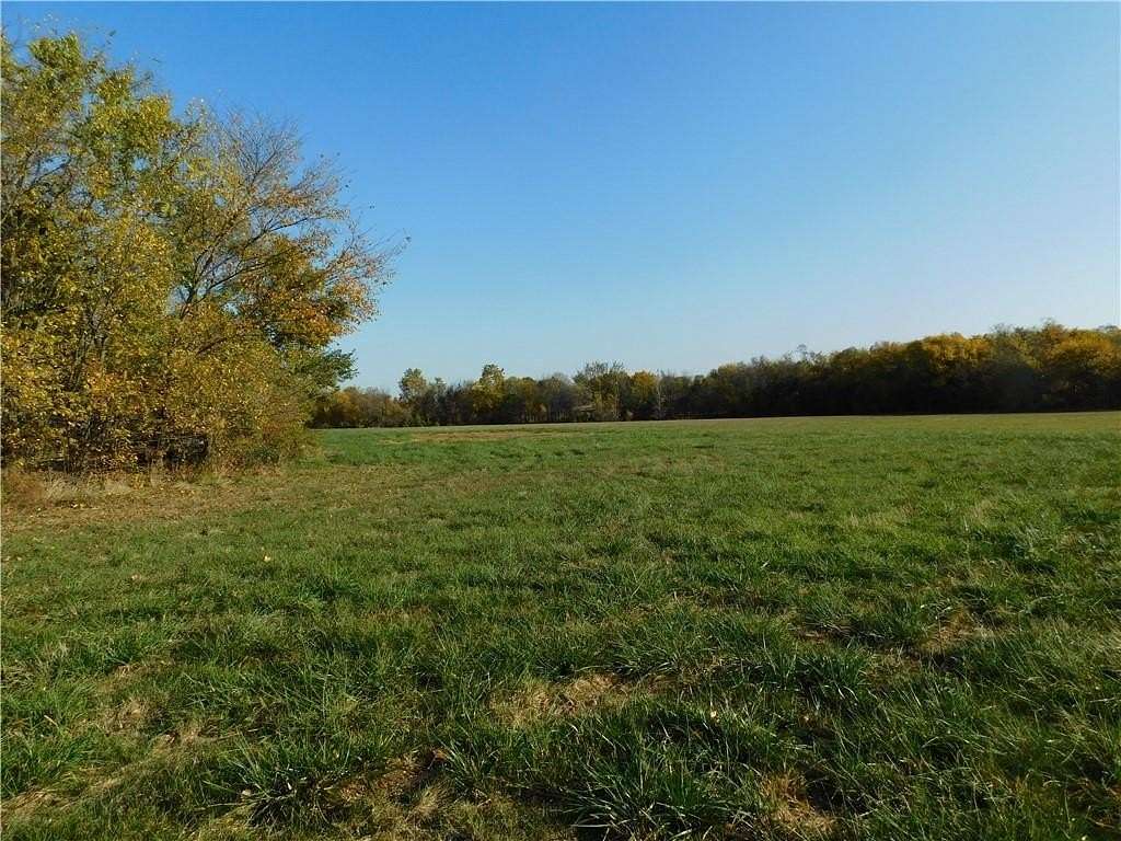 50 Acres of Land with Home for Sale in Harrisonville, Missouri