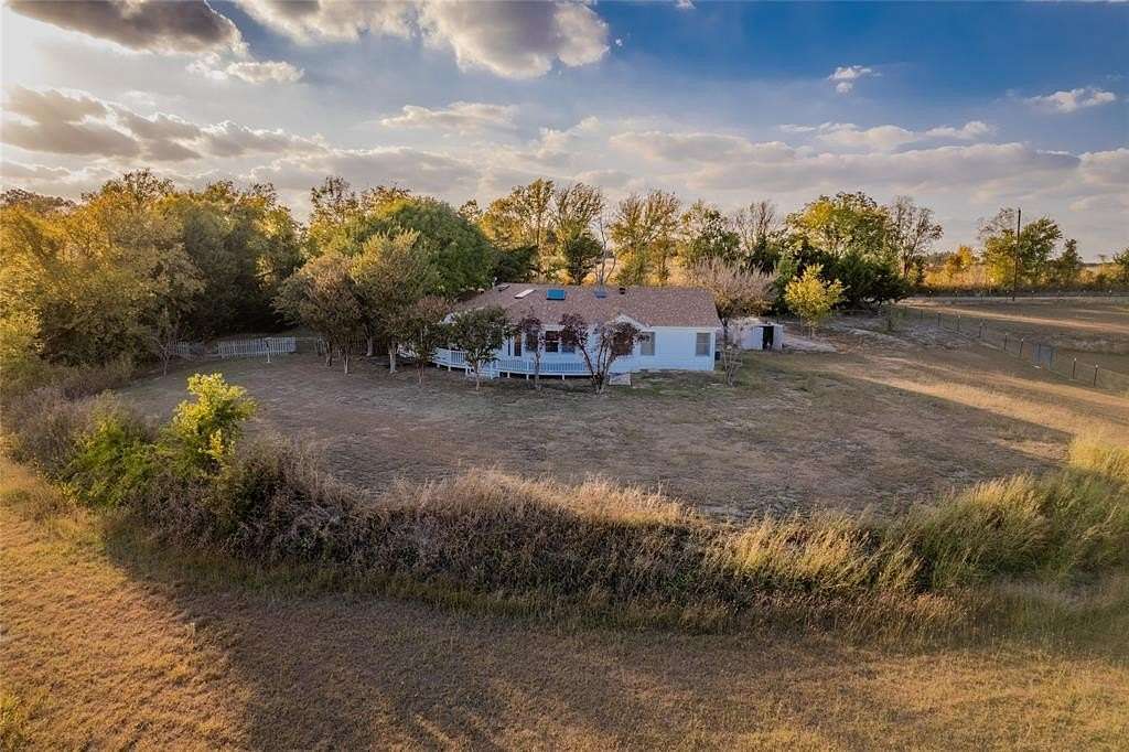 14.2 Acres of Land with Home for Sale in Whitewright, Texas