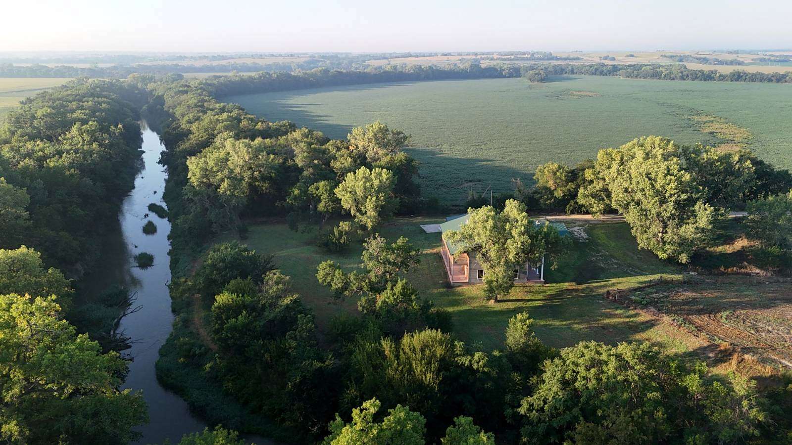19.3 Acres of Land with Home for Sale in Beloit, Kansas