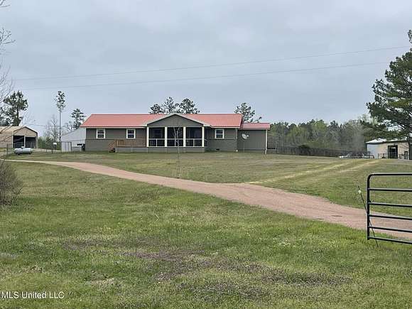 3.5 Acres of Residential Land with Home for Sale in Braxton, Mississippi