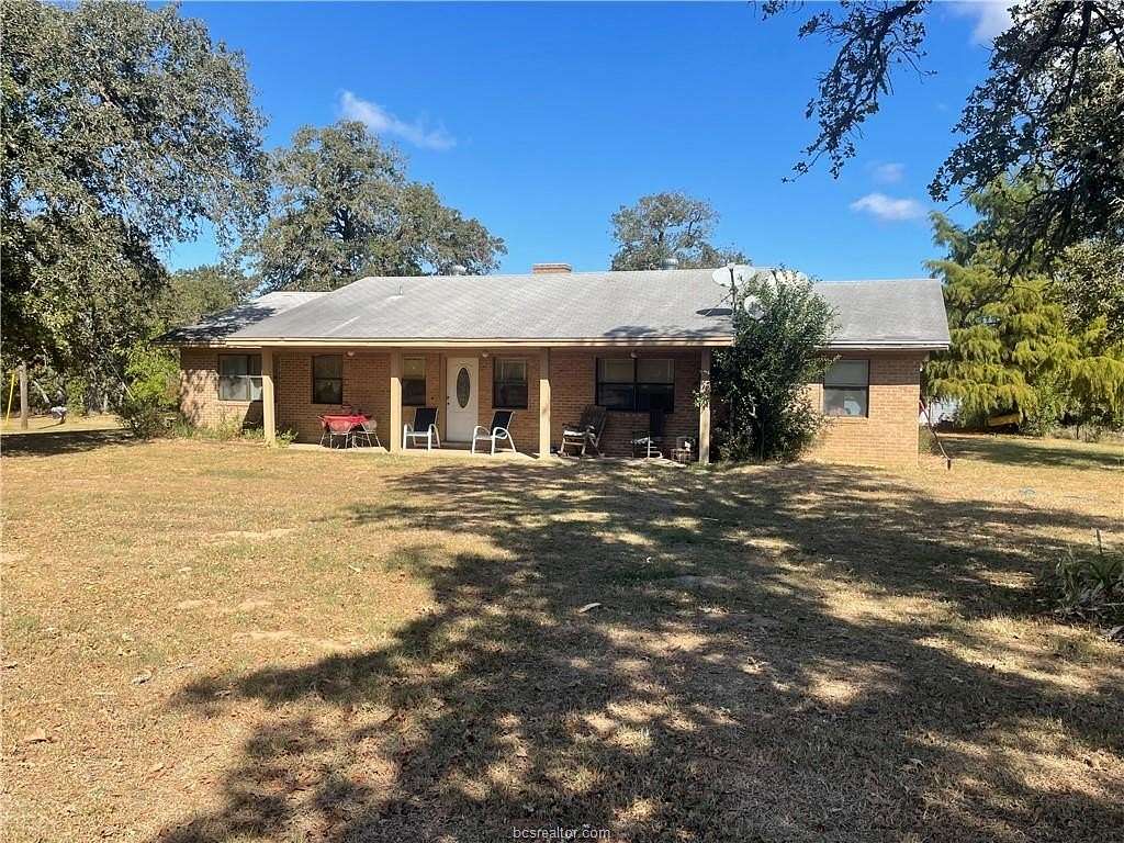 16.276 Acres of Land with Home for Sale in Caldwell, Texas