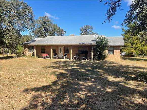 16.276 Acres of Land with Home for Sale in Caldwell, Texas