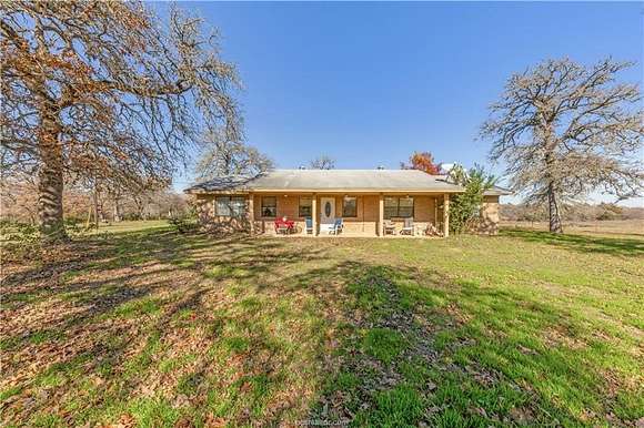 16.276 Acres of Land with Home for Sale in Caldwell, Texas