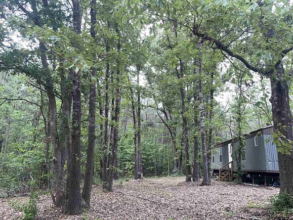 14.21 Acres of Recreational Land with Home for Lease in Alto, Texas