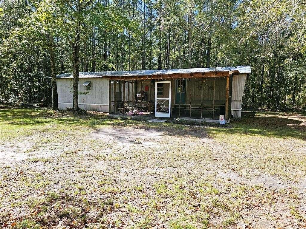 2.85 Acres of Residential Land with Home for Sale in Townsend, Georgia