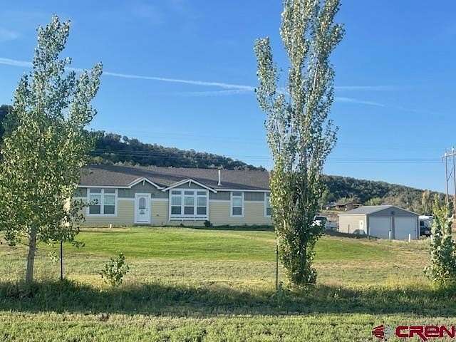 3.05 Acres of Residential Land with Home for Sale in Mancos, Colorado