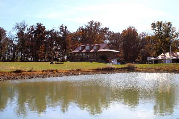 16.79 Acres of Land with Home for Sale in Paris, Missouri