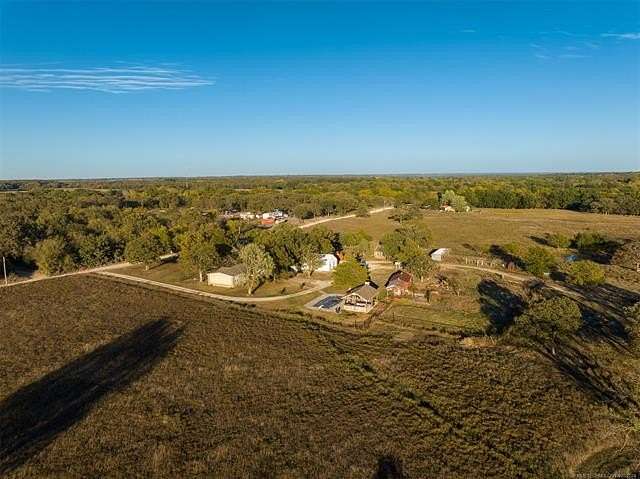 90 Acres of Land with Home for Sale in Wann, Oklahoma