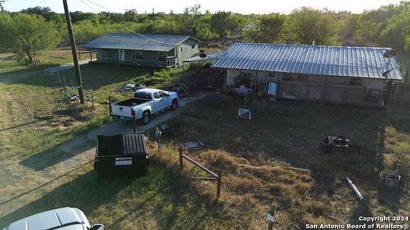 10 Acres of Land with Home for Sale in Lytle, Texas