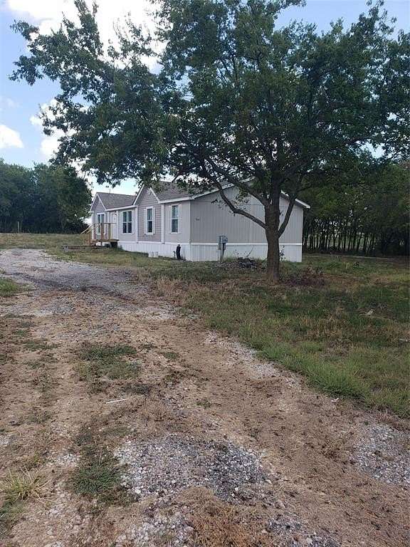 2.56 Acres of Residential Land with Home for Sale in Royse City, Texas