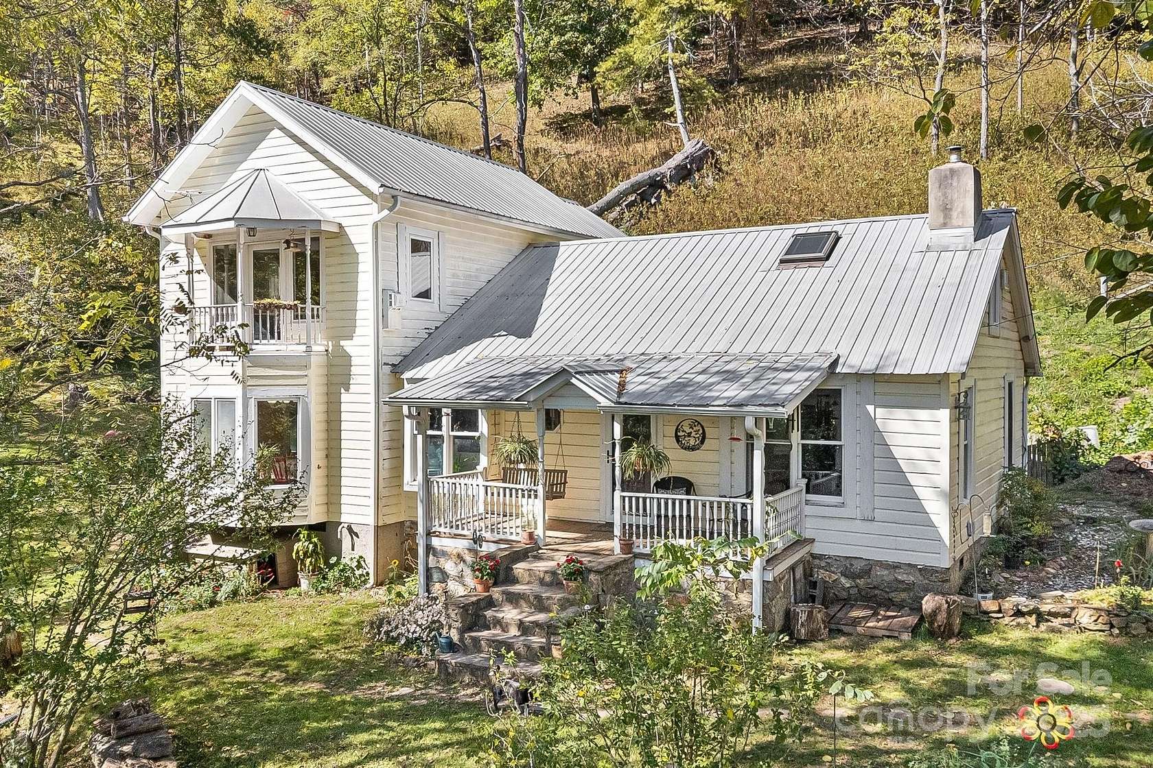 21.8 Acres of Land with Home for Sale in Marshall, North Carolina