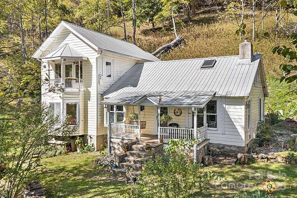 21.8 Acres of Land with Home for Sale in Marshall, North Carolina