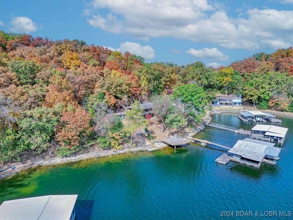 2.3 Acres of Residential Land with Home for Sale in Lake Ozark, Missouri