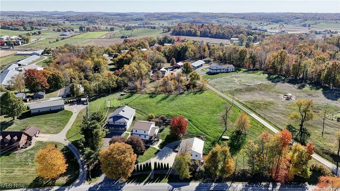 2.95 Acres of Residential Land with Home for Auction in Sugarcreek, Ohio