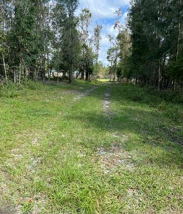 20.02 Acres of Land with Home for Sale in Live Oak, Florida