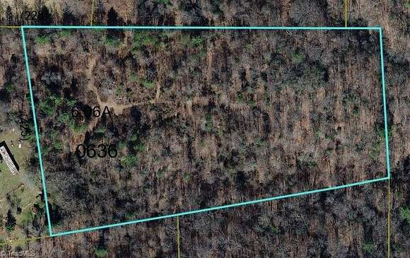 10.56 Acres of Land with Home for Sale in Roaring River, North Carolina