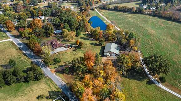 9.55 Acres of Land with Home for Sale in Jackson, Missouri