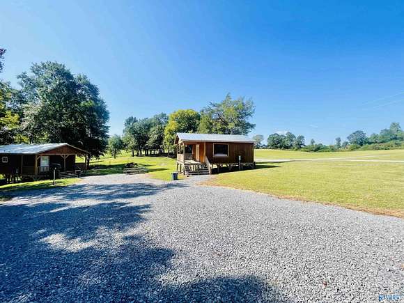 41.5 Acres of Land with Home for Sale in Horton, Alabama