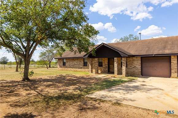 14.45 Acres of Land with Home for Sale in Waelder, Texas