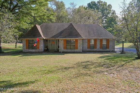 3.4 Acres of Residential Land with Home for Sale in Walls, Mississippi