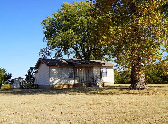 40 Acres of Agricultural Land with Home for Auction in Chandler, Oklahoma