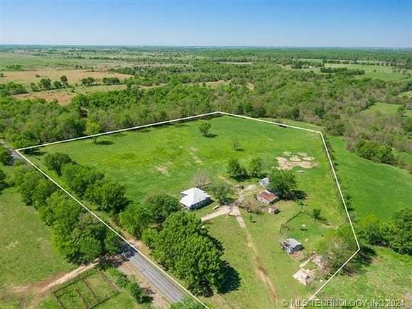 12.805 Acres of Land with Home for Sale in Delaware, Oklahoma