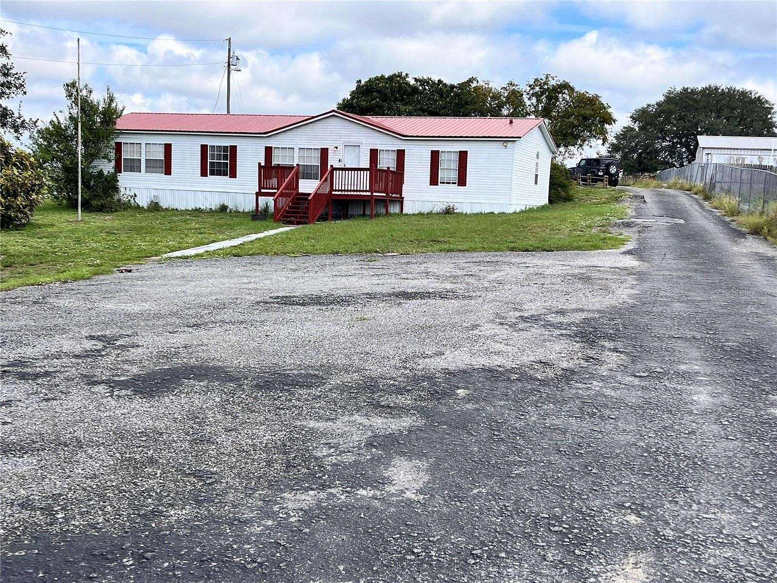 2.07 Acres of Residential Land with Home for Sale in Haines City, Florida