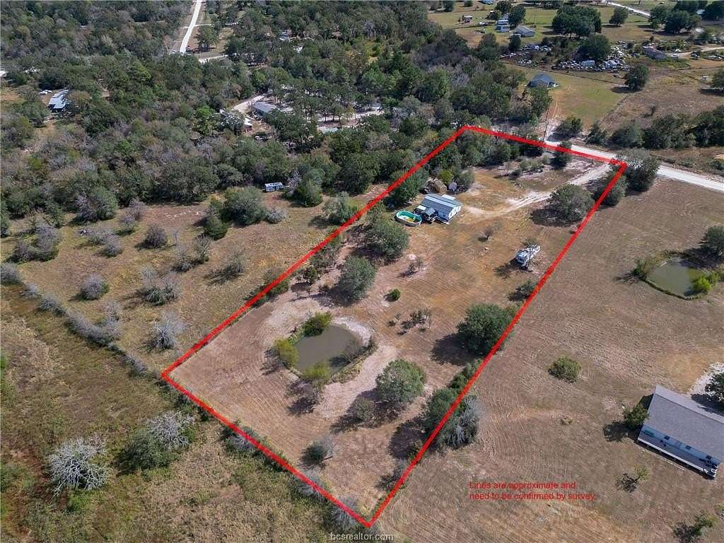 3 Acres of Residential Land with Home for Sale in Bedias, Texas