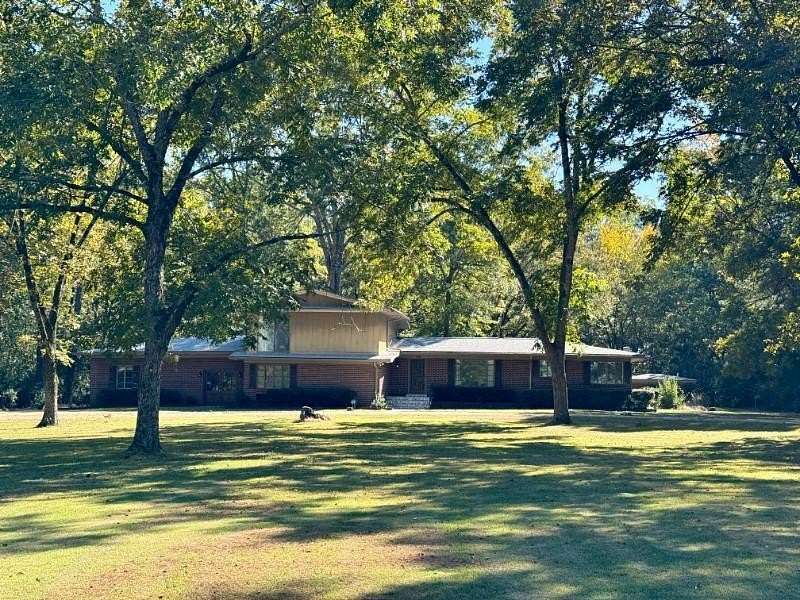 3.2 Acres of Residential Land with Home for Sale in Houston, Mississippi