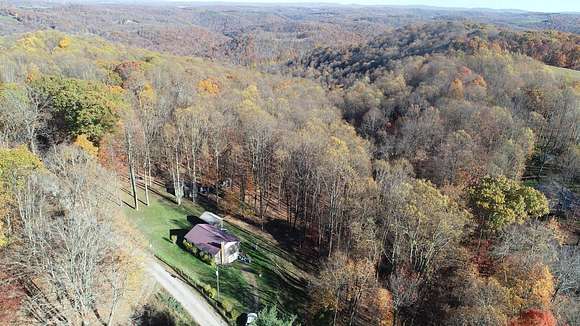 22 Acres of Recreational Land with Home for Auction in Bruceton Mills, West Virginia