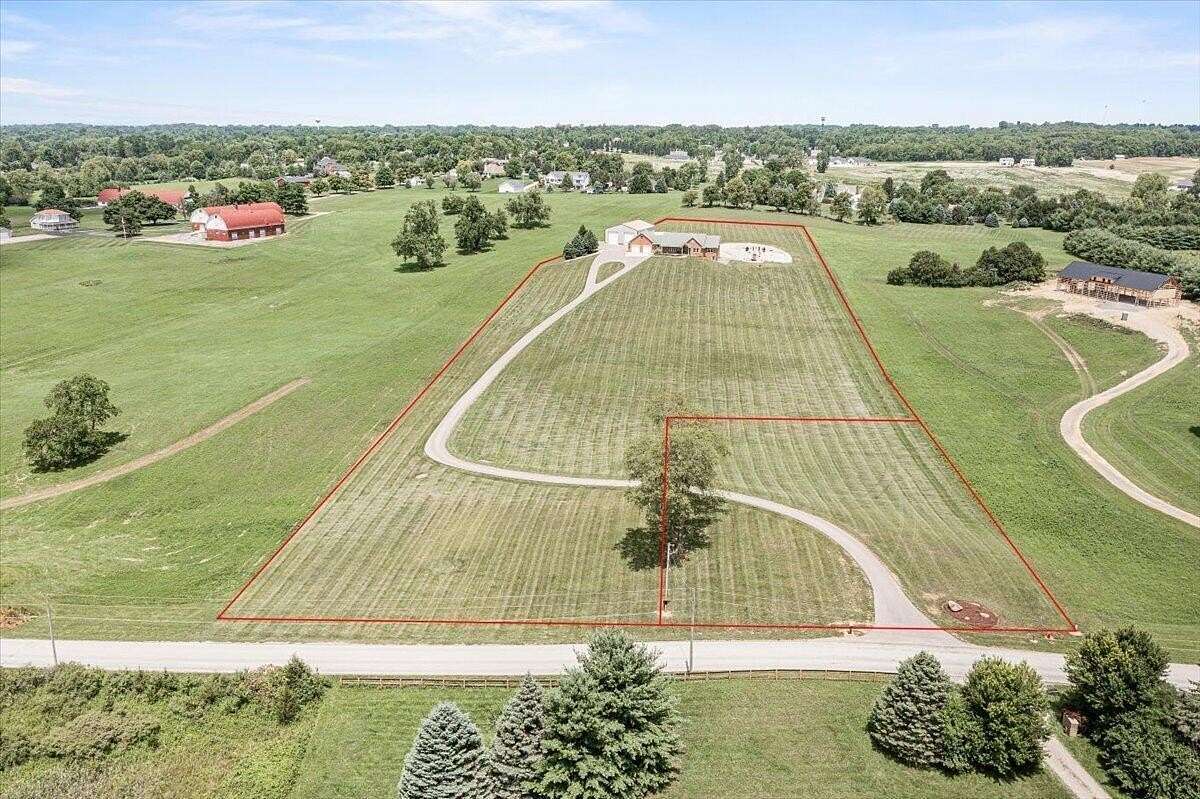 6.9 Acres of Residential Land with Home for Sale in Bellefontaine, Ohio