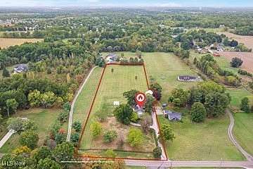 5.03 Acres of Residential Land with Home for Auction in Canton, Ohio