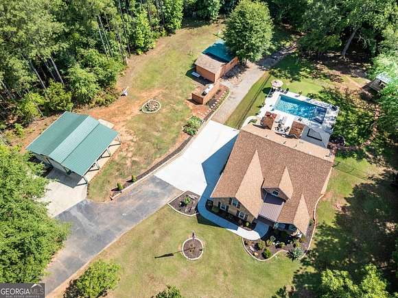 10.7 Acres of Land with Home for Sale in Mansfield, Georgia