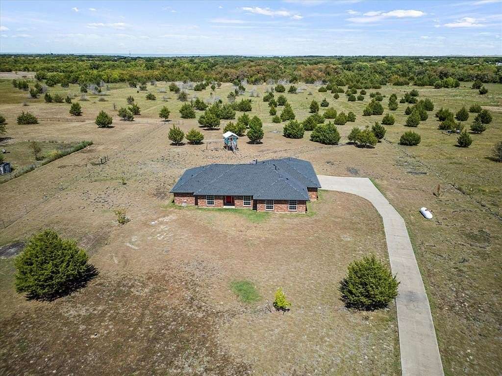 10 Acres of Residential Land with Home for Sale in Farmersville, Texas