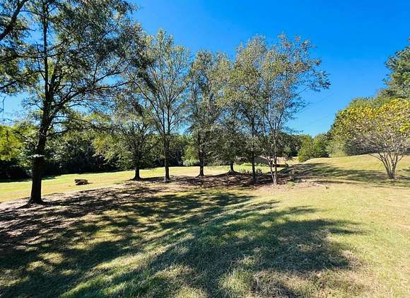 13.4 Acres of Land with Home for Sale in Winfield, Alabama